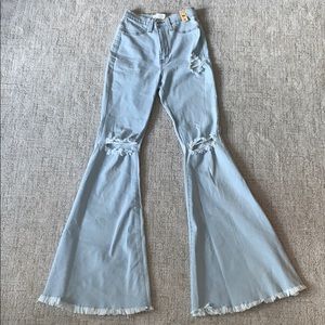 Bell bottoms stretchy light wash distressed jeans